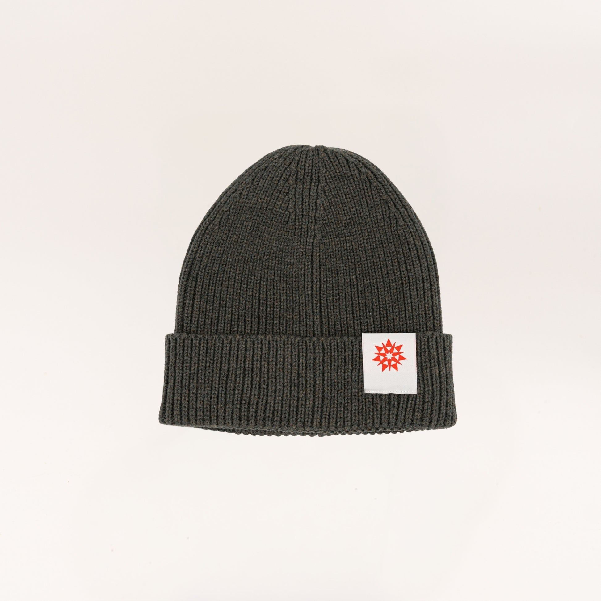 Dark grey knit recycled cuffed beanie with Higher grounds Logo patch 