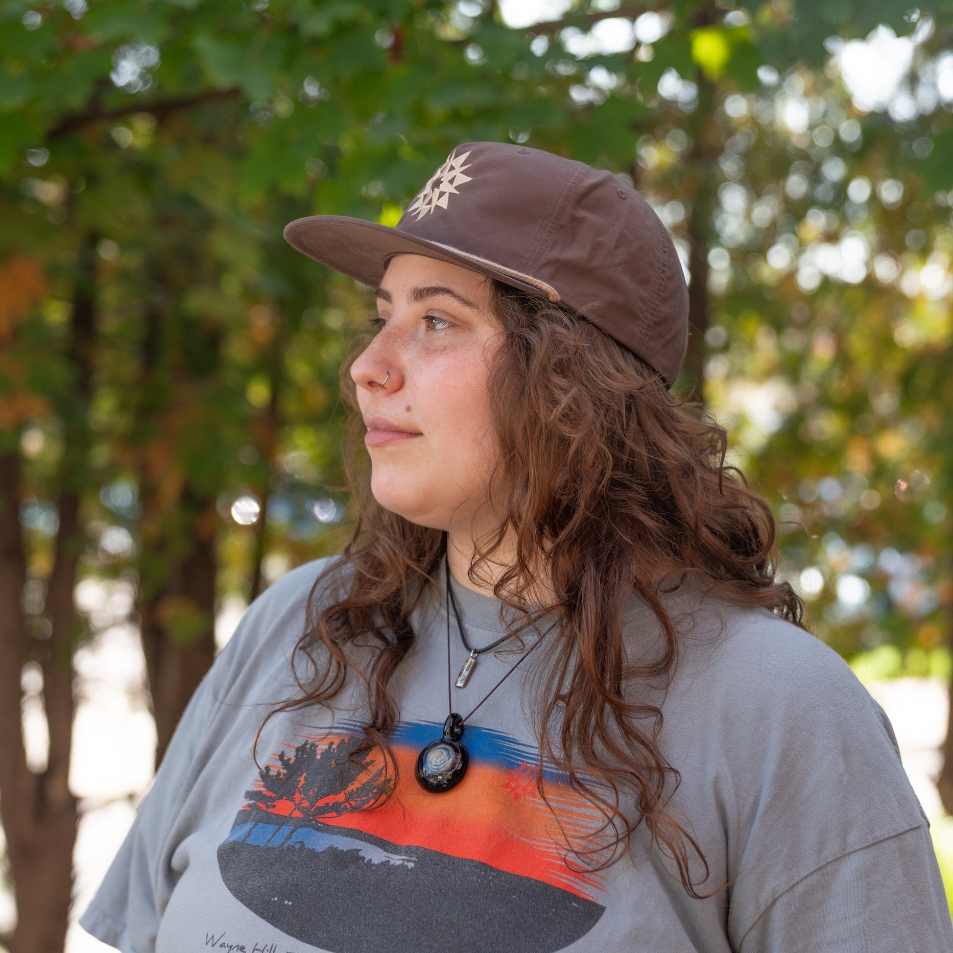 Star Rope Hat with Higher Grounds Trading Co star logo on front and rope brim feature in desert mocha 