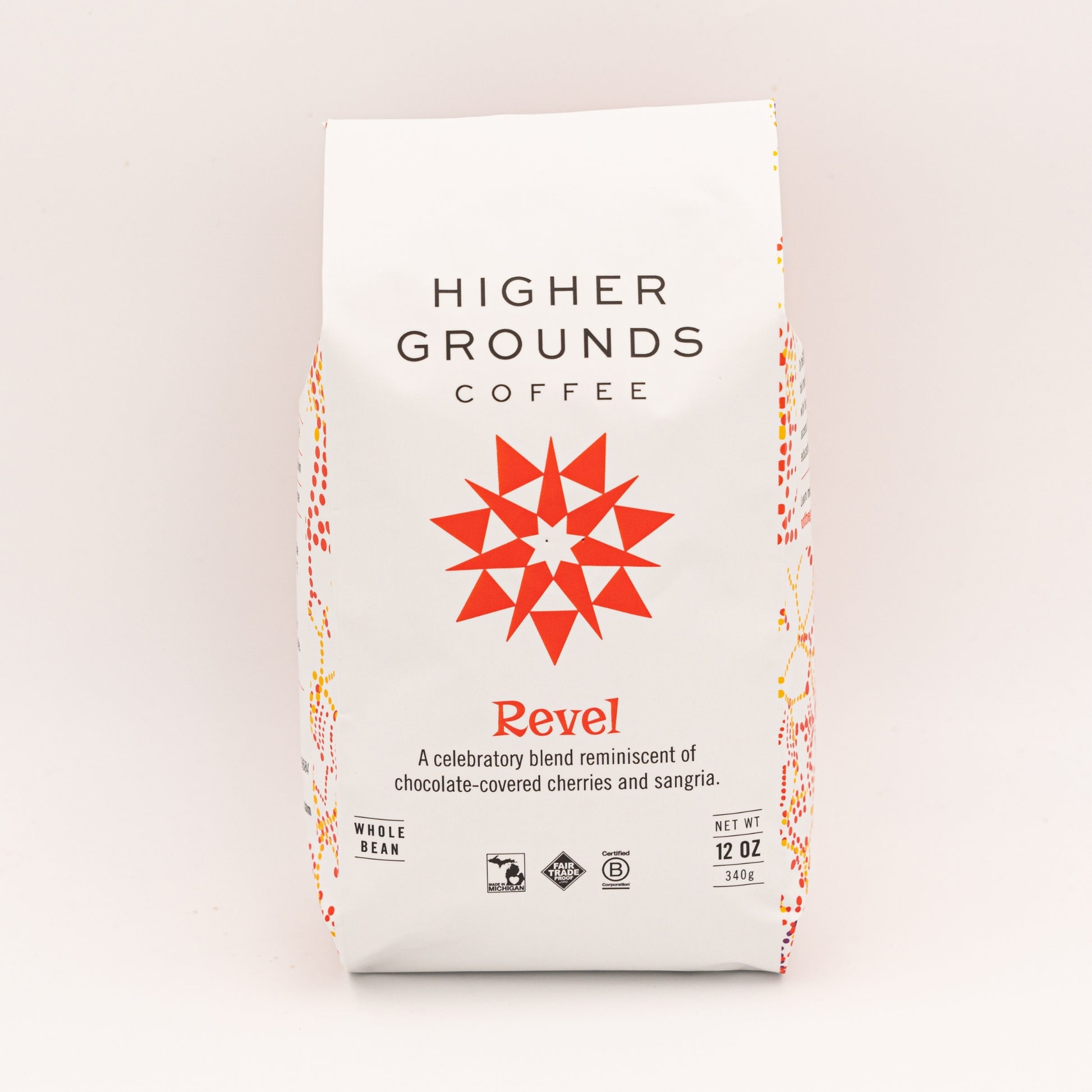 bag of organic seasonal Revel blend Coffee For 
Change coffee beans from Higher Grounds Trading Co