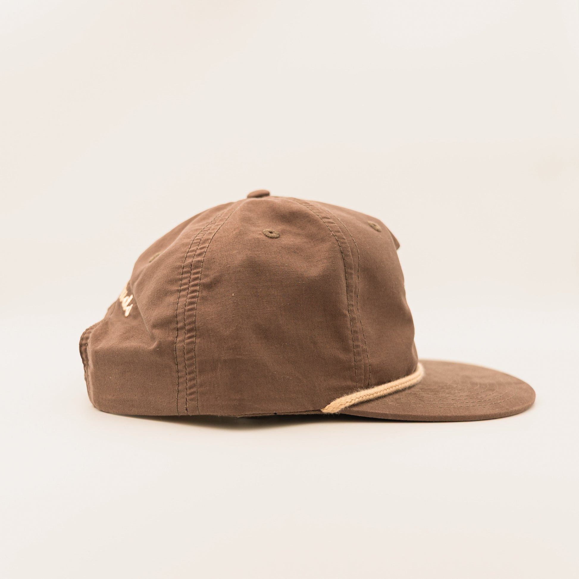Star Rope Hat with Higher Grounds Trading Co star logo on front and rope brim feature in desert mocha 
